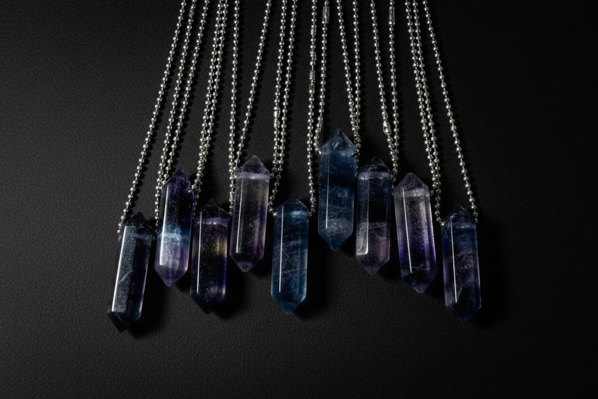 Crystal necklaces on plain matte black