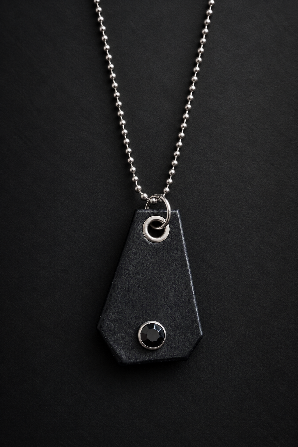 Hero product photo of black leather pendant necklace